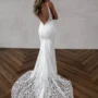 Model wearing Elliot bridal gown by Made With Love bridal dresses (full back view)